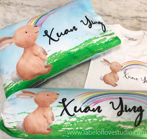 personalised baby gifts with a personalised romper, pillow and bolster.