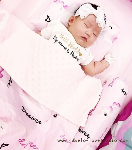 Personalised baby gifts made in Singapore, with baby blanket, pillow and bolster, and a matching personalised romper